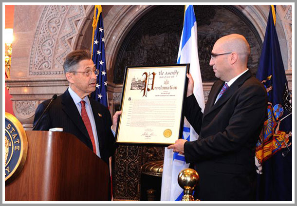 Assembly Speark Sheldon Silver presents Asaf Shariv, the Consul General of Israel, with an Assembly proclamation