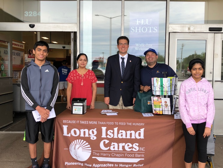 Vidya Thandarath, her children, Assemblyman John Mikulin and Errol Parker pictured during the food drive at King Kullen.