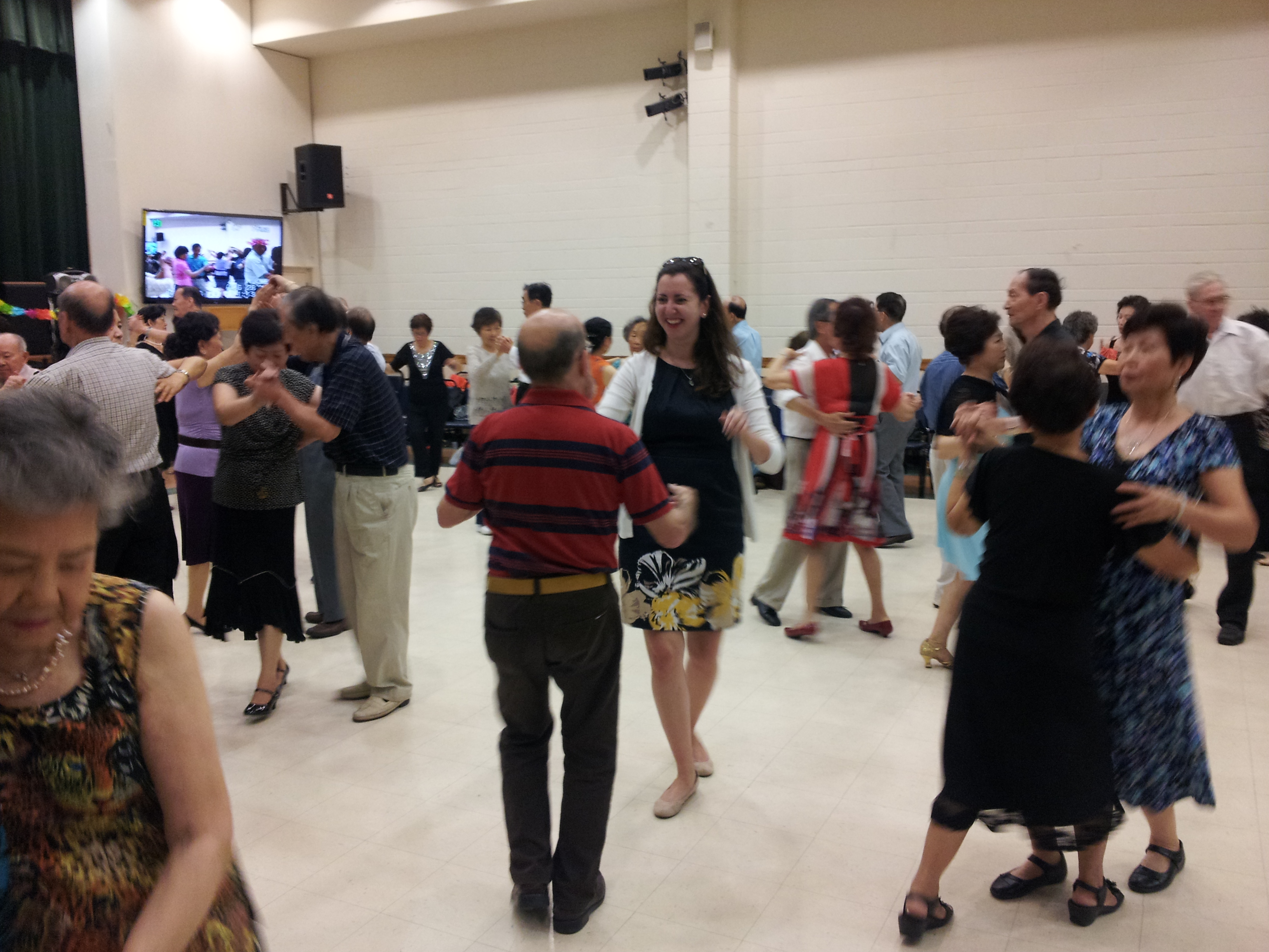 Assemblywoman Nily Rozic exchanged fancy footwork and community ideas with seniors at the Self Help Rosenthal Senior Center in Flushing.