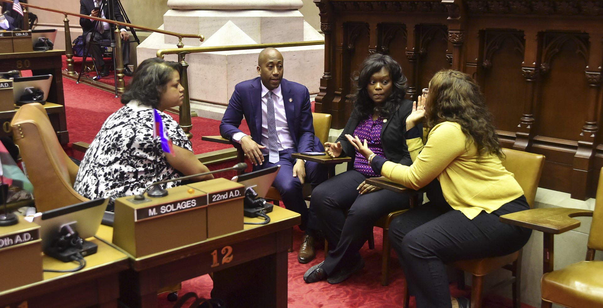 Assembly member Vanel speaking with Haitian Caucus