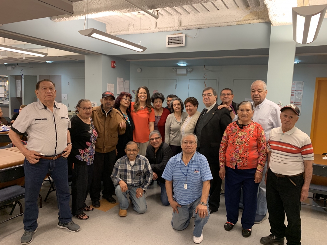 Assemblywoman Cruz visiting seniors at local senior center Raices.