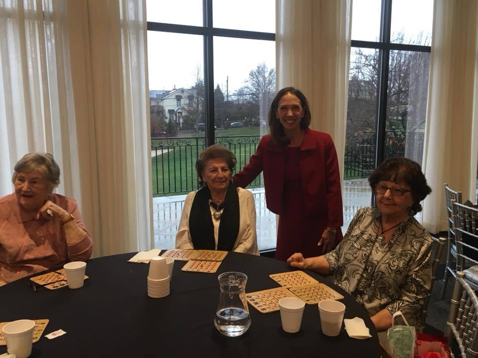 Assemblywoman Amy Paulin giving out holiday cookies to Eastchester seniors.