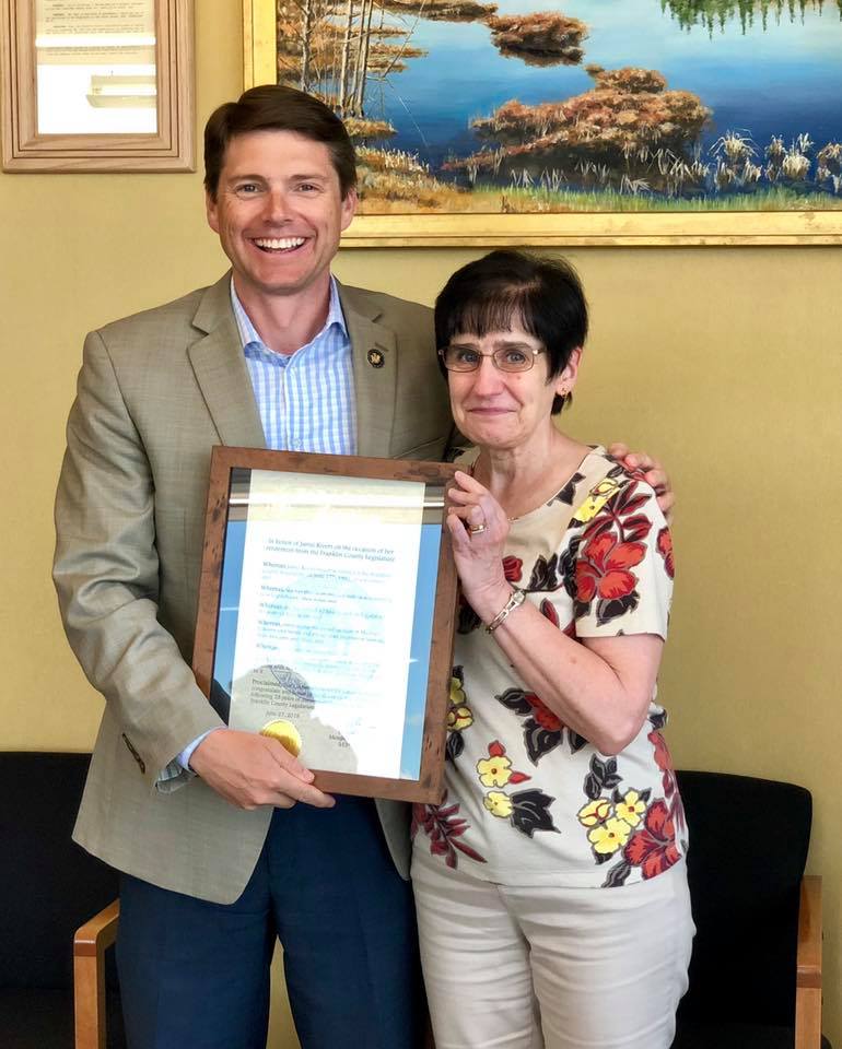 Assemblyman Billy Jones presented a citation to Jamie Rivers on her retirement after 28 years of service to the Franklin County Legislature.