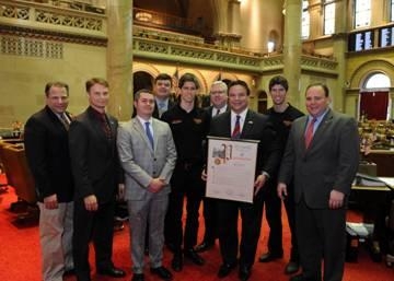 Assemblyman Andrew Raia; Assemblyman Christopher S. Friend; Andrew Smith, Director of Marketing & Promotions, Watkins Glen International; Job Beckman, Vice President of Business & Development, Watkins