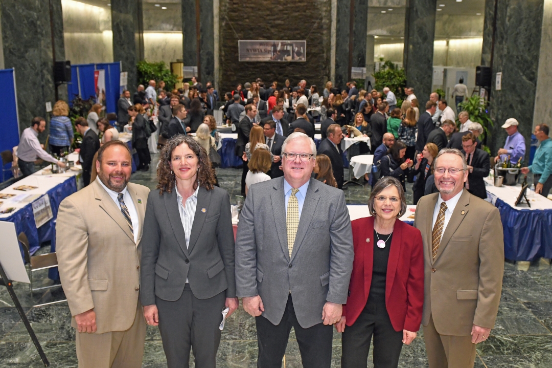 From left to right at last night's Sip and Sample in The Well of the Legislative Office Building in Albany: State Agriculture Commissioner Richard Ball, Senator Jen Metzger, Senator O&
