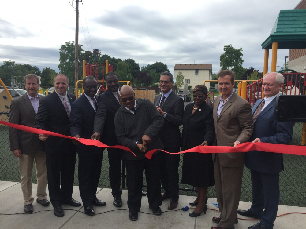 September 30, 2016 – Assemblywoman Peoples-Stokes stands with colleagues in government, community leaders the ribbon cutting ceremony for The Bellamy Commons. The affordable housing mixed use developm