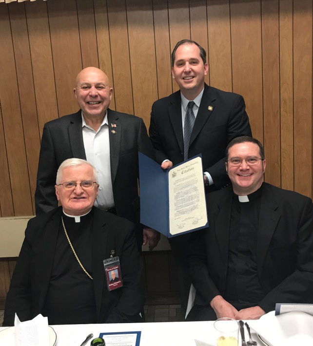 Assemblyman Angelo J. Morinello (R,C,I,Ref-Niagara Falls), joins Assemblyman Mike Norris (R,I-Lockport), Bishop Edward Grosz and Pastor Jim Bastian for the 125th Anniversary celebration.