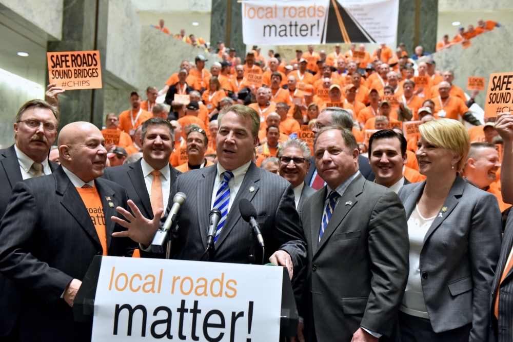 Assemblyman David DiPietro (R,C-East Aurora) speaks at a rally in favor of increased infrastructure funding at the State Capitol.