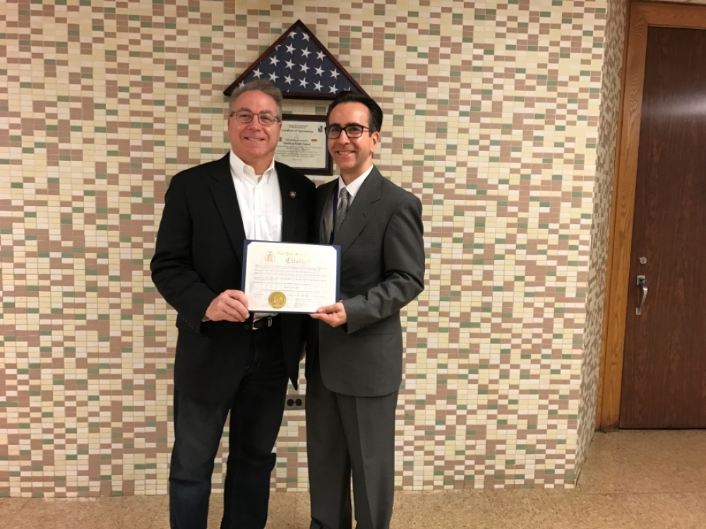 Pictured left to right: Assemblyman David DiPietro (R,C-East Aurora) and Hamburg Middle School Social Studies teacher Jason Steinagle