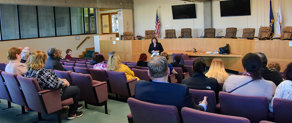 Assemblywoman Buttenschon speaking with constituents at the Rome Town Hall