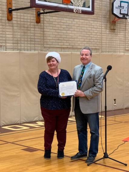 Assemblyman David DiPietro (R,C,I-East Aurora) pictured with a teacher of excellence Kimberly Alfes.