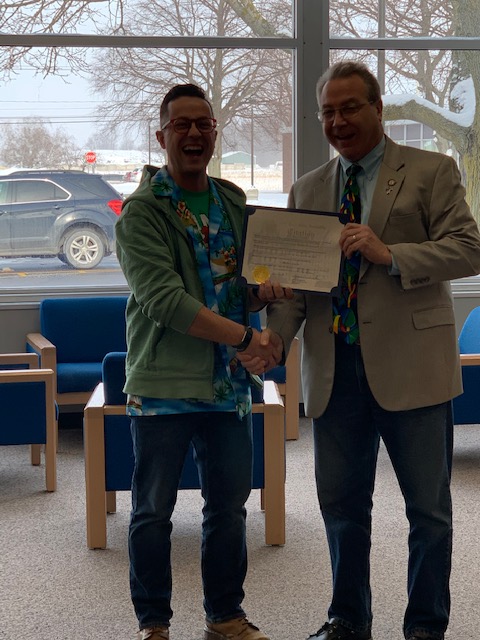 Assemblyman David DiPietro (R,C,I-East Aurora) pictured with a teacher of excellence Matthew Struzik.