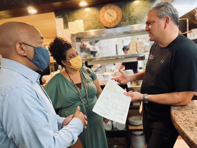 Pictured in the second photo are Speaker Heastie and Assemblymember Gina Sillitti talking about water and sewer infrastructure needs with Tommy Pagonis of Manhasset’s Louie’s Restaurant